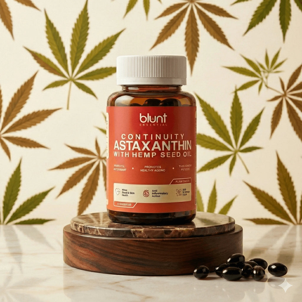 Bottle of Blunt Astaxanthin with Hemp Seed Oil on a wooden stand with a cannabis leaf pattern in the background